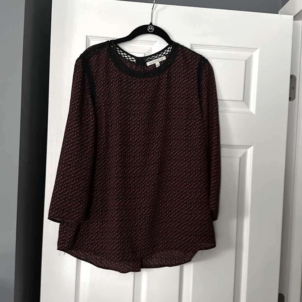 Daniel Rainn blouse long sleeve, high low, Buttons up the back. Only worn once.